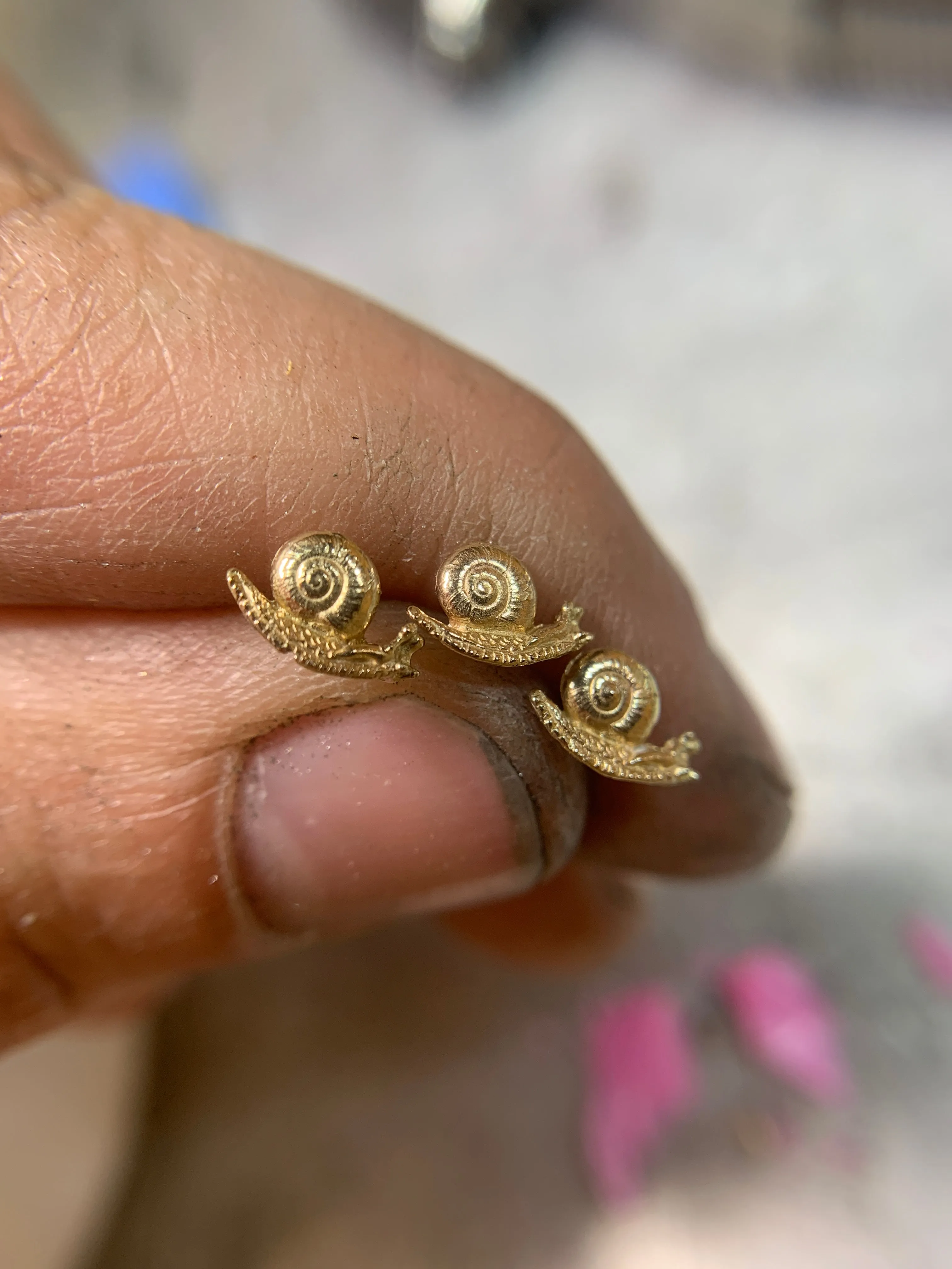 snail earrings in gold