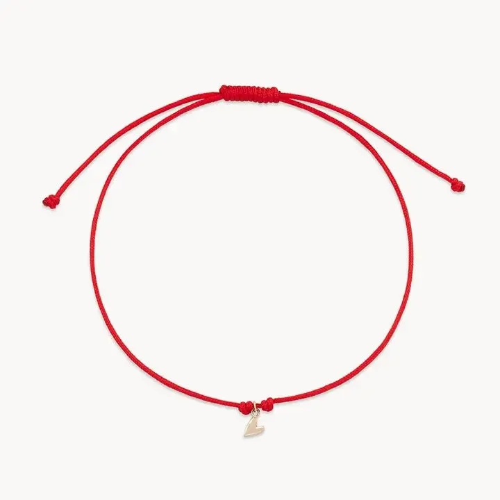 The deep love contemplation cord bracelet - 10k yellow gold, red cord